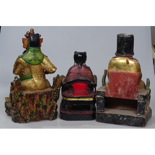 4 - 2 carved and painted wood Oriental seated figures, height 10