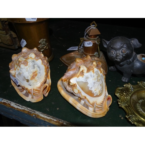 401 - Shells with portrait decoration, a dog pin cushion, an Art Nouveau desk stand etc