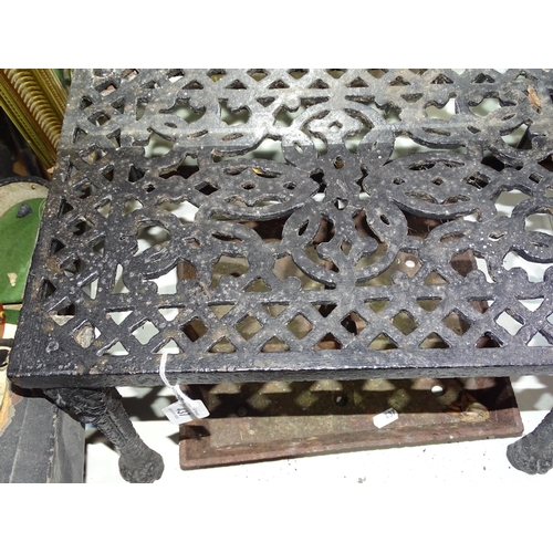 437 - A large iron trivet, length 16.5