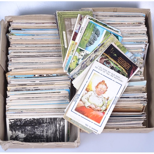 44 - A postcard album including First World War, and 2 boxes of loose postcards