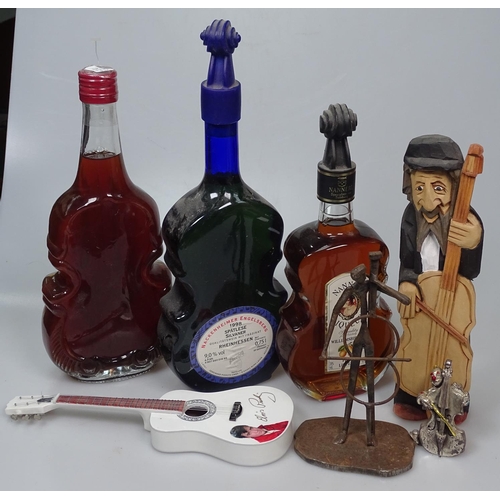 46 - Austrian liqueur in a violin-shaped bottle, wine, a carved wood figure etc