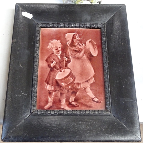 535 - A pair of Victorian framed tiles depicting children, height 12.5