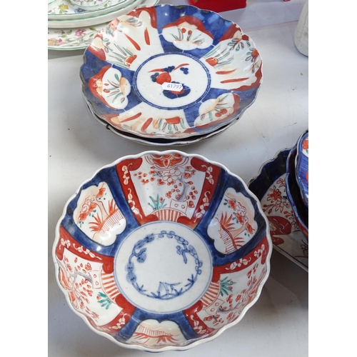 537 - A pair of Imari shell design dishes, and other Imari bowls and plates