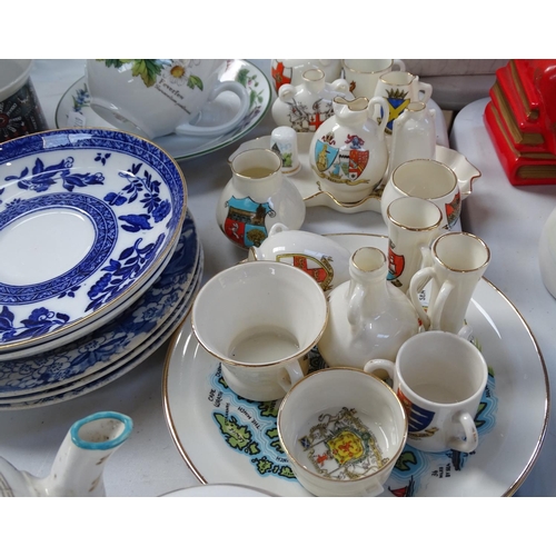 568 - A Victorian porcelain teaset, Crested ware items etc