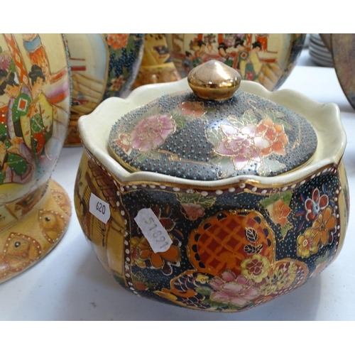 579 - A pair of Oriental jars and covers, a similar pot etc