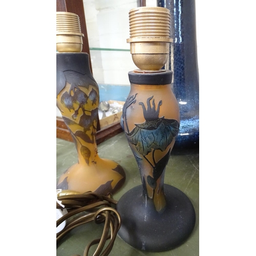 580 - 2 Galle style glass lamp bases with floral designs, tallest 12.5