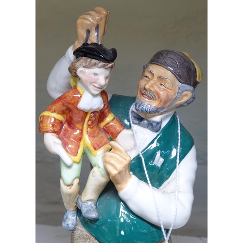 593 - A Royal Doulton puppet maker figure