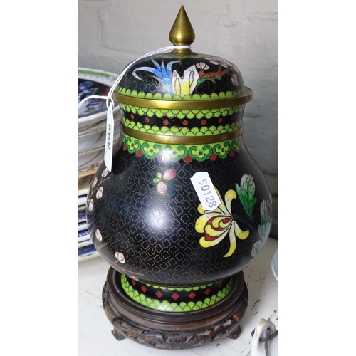 598 - A cloisonne jar and cover on stand, a blue and white Oriental jar, a vase etc