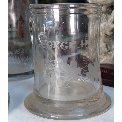 659 - 4 19th century glass mugs, with etched decoration, tallest 5.5