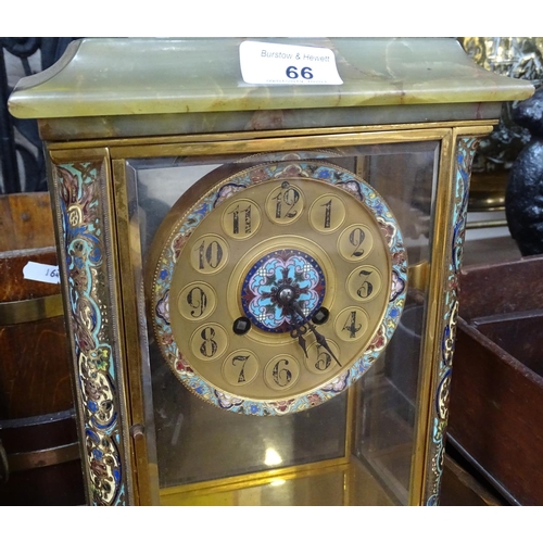 66 - An onyx-cased clock with enamelled brass mounts, height 13.25