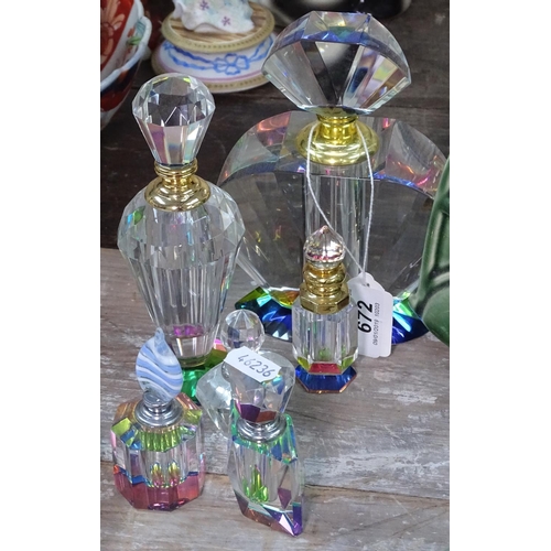 672 - Decorative scent bottle, tallest 6.75