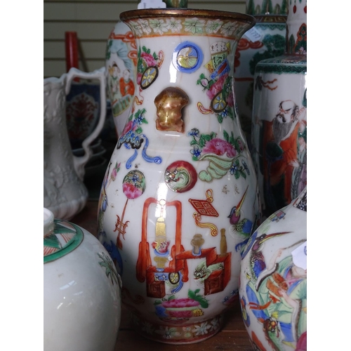 680 - 2 Chinese vases and a jar