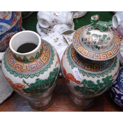 682 - A pair of Chinese famille vert jars and covers, 13