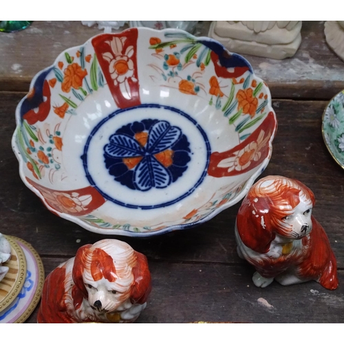 698 - Imari bowls, Staffordshire dogs, a small Record plane etc