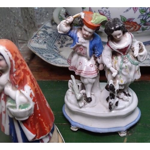 701 - A Continental porcelain figure group, and other figures