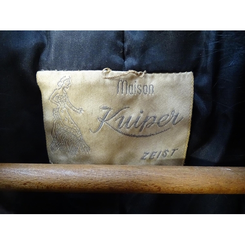 767 - A lady's velvet and fur lined full length coat, label for Maison Kuiper, Zeist