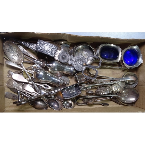 819 - A box containing silver plated candle snuffers, cruets, and cutlery etc