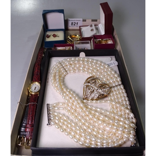 821 - A tray of costume jewellery and wristwatches