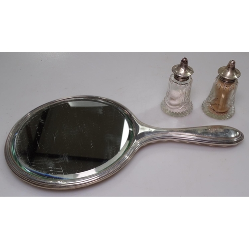 844 - An engraved silver dressing table mirror, and a pair of cut-glass and silver-mounted salt jars