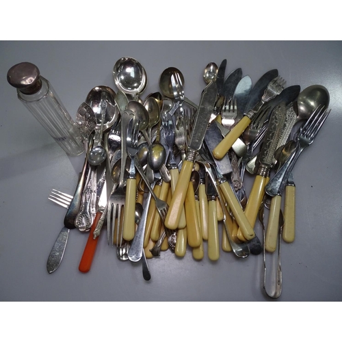 850 - A silver-topped toilet jar, and a quantity of mixed plated cutlery