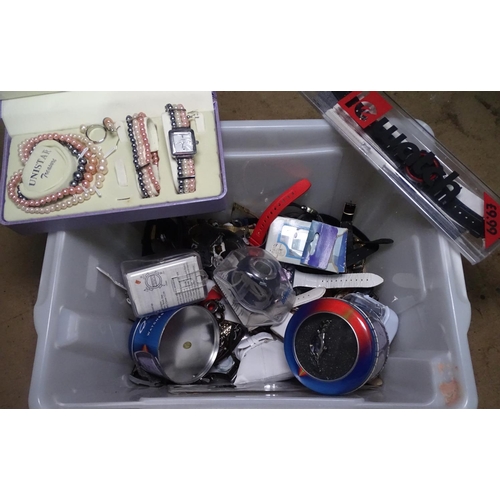 854 - A box of mixed modern wristwatches