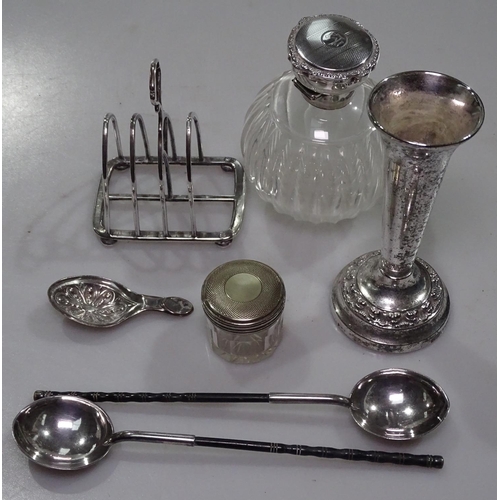 858 - A silver-topped scent bottle, a silver toast rack, a silver-topped rouge pot etc