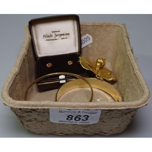 863 - Cased gold earrings, a rolled gold bangle, a gilded bangle etc