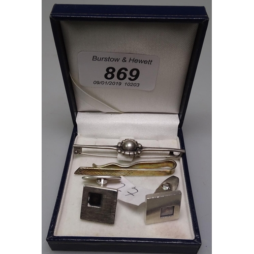 869 - A pair of silver cufflinks by N E From, a silver brooch and a silver tie clip