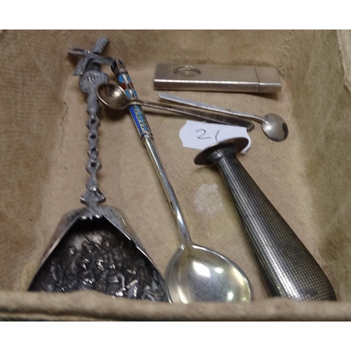 875 - A Russian silver and enamel spoon, a silver cigar clipper, a seal etc