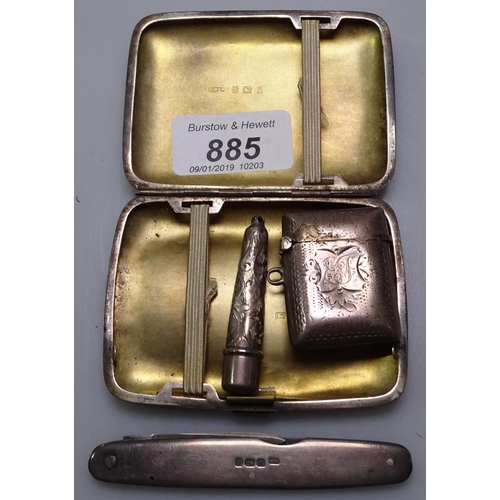 885 - An engine turned silver cigarette case, a silver vesta, a silver cased cigarette holder, a silver mo... 