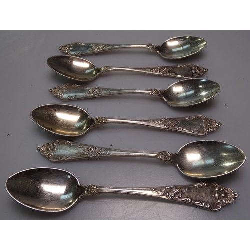 891 - A set of 6 Russian embossed silver teaspoons, 4oz