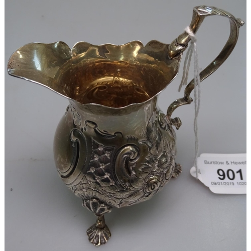 901 - A Victorian silver and embossed cream jug, on 3 cast feet, London 1889