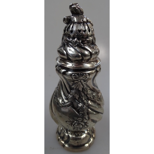 902 - A German silver sugar caster, with floral embossed decoration, maker's marks to base, height 14cm