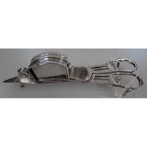 903 - A 19th century cast-silver candle snuffer / wick trimmer, with shell embossed decoration, L16.5cm