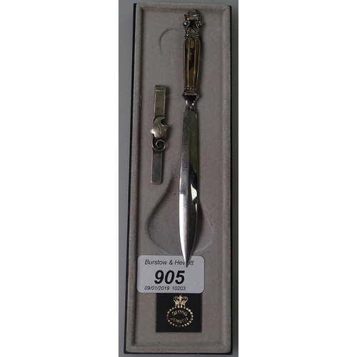 905 - A Georg Jensen Kongers pattern silver-handled paper knife, and a stylish silver tie clip (2)