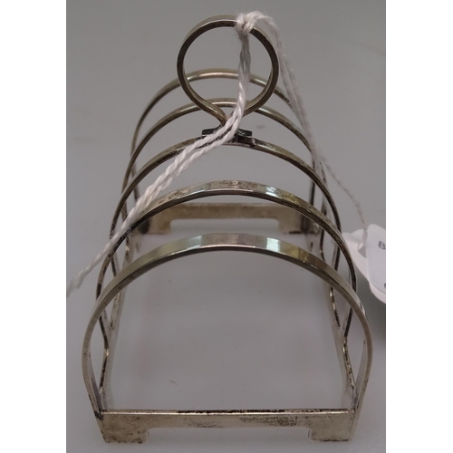 908 - A small Edwardian silver toast rack