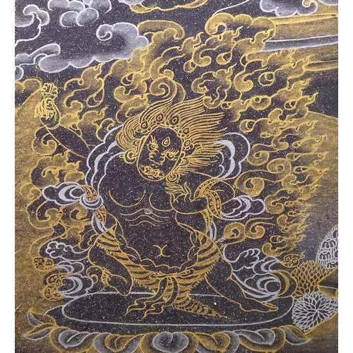 932 - An Oriental gilded religious painting, framed, 46cm x 60cm