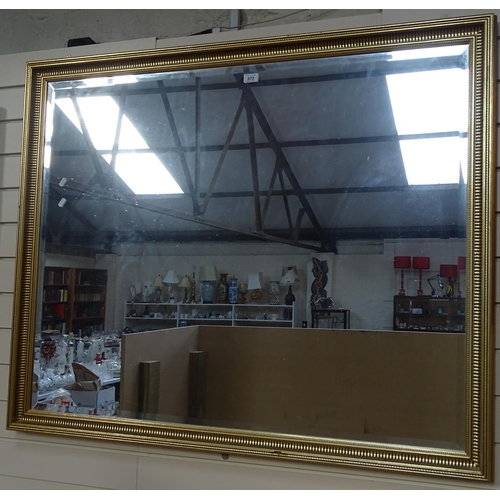 973 - A large modern gilt-framed, bevel-edged wall mirror, W125cm, H102cm