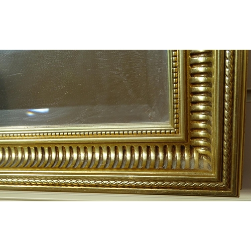 973 - A large modern gilt-framed, bevel-edged wall mirror, W125cm, H102cm