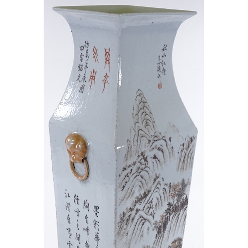 66 - A Chinese porcelain square section vase with painted mountain landscape and text, height 57cm, rim d... 