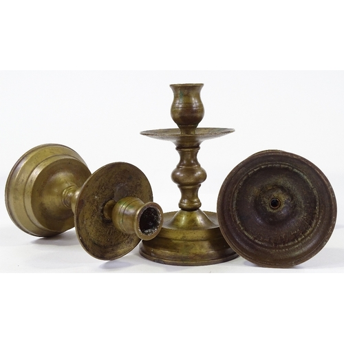 85 - A set of bronze candle stands, height 14cm