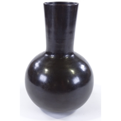 205 - A Studio bronze narrow-necked vase, unsigned, height 31cm