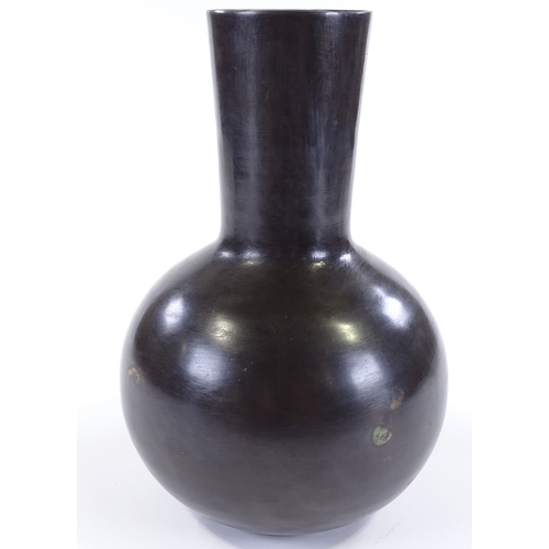 205 - A Studio bronze narrow-necked vase, unsigned, height 31cm