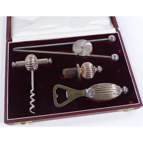 119 - An Asprey's plated cocktail set in original fitted case