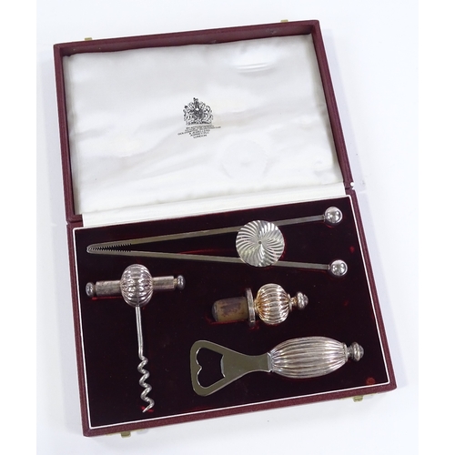 119 - An Asprey's plated cocktail set in original fitted case