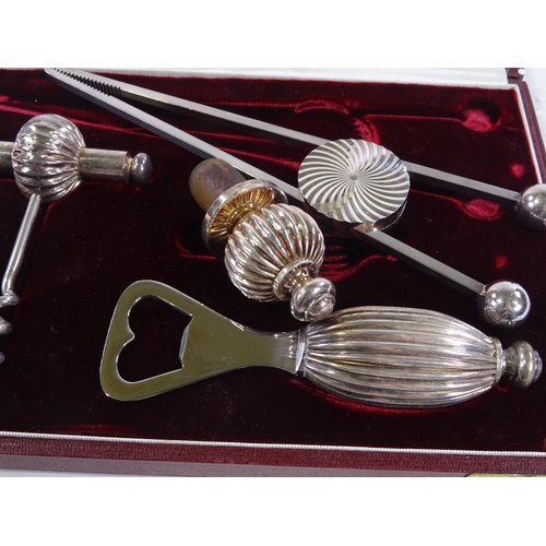 119 - An Asprey's plated cocktail set in original fitted case