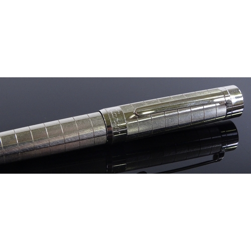 123 - A Cartier silver plated ballpoint pen