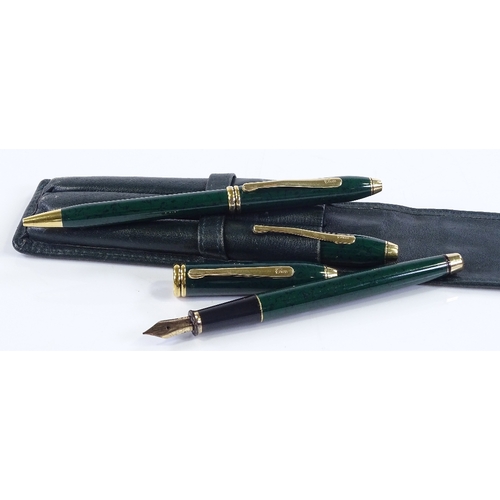 124 - A cased set of 3 Cross green lacquer pens