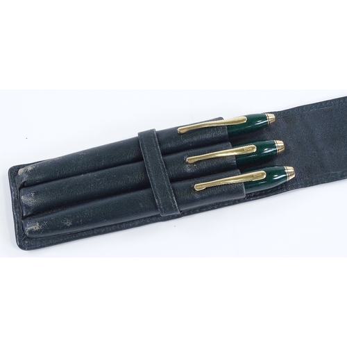 124 - A cased set of 3 Cross green lacquer pens