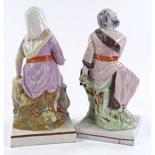 126 - 2 19th century Staffordshire Pottery figures of Elijah and the Widow of Zarephath, circa 1820, heigh... 